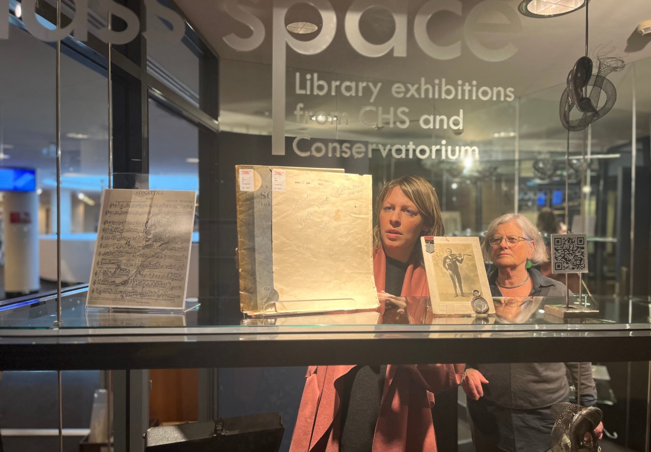 Julia Russoniello and Victoria Monk installing the exhibition Listening Back, 2023