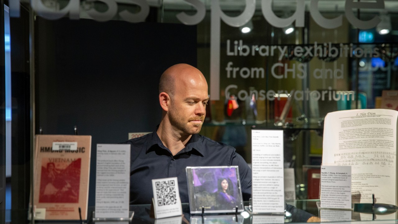 Dr Steve Barry installing the exhibition at the Conservatorium Library
