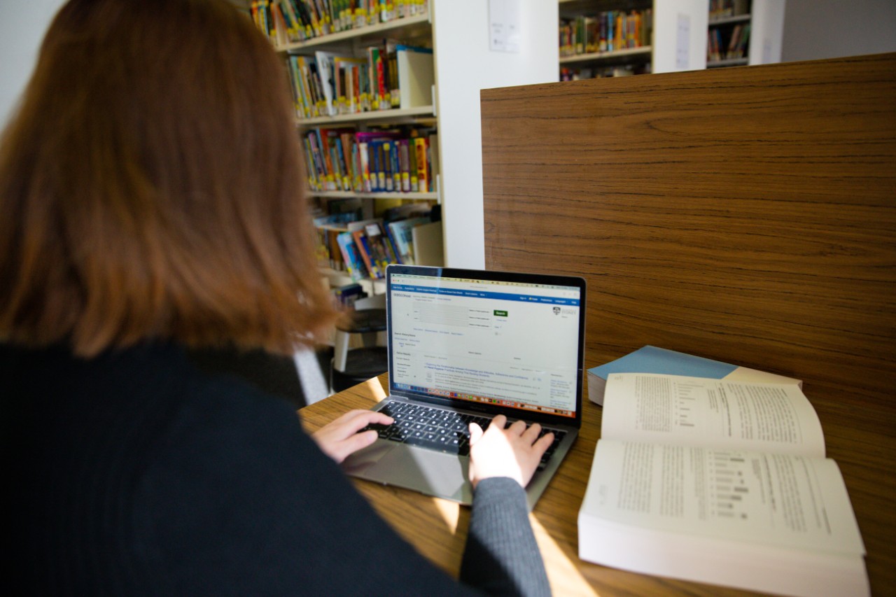 person using EBSCO database