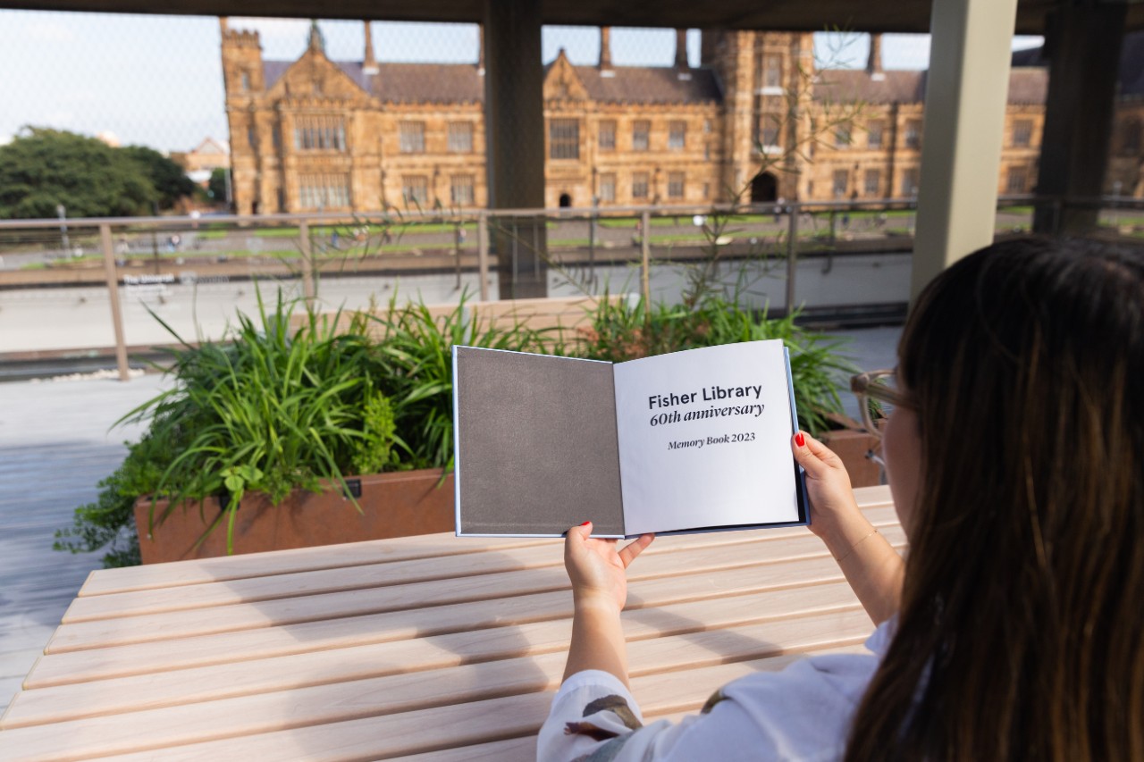 Person flicking through the Memory Book