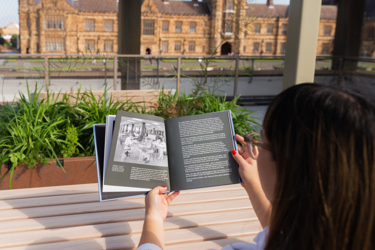 Person flicking through the Memory Book