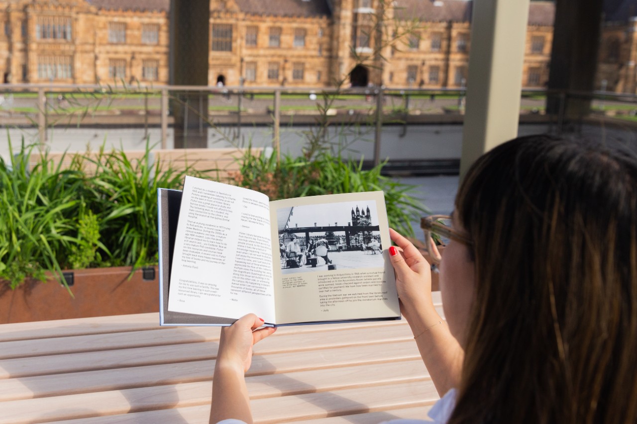 Person flicking through the Memory Book