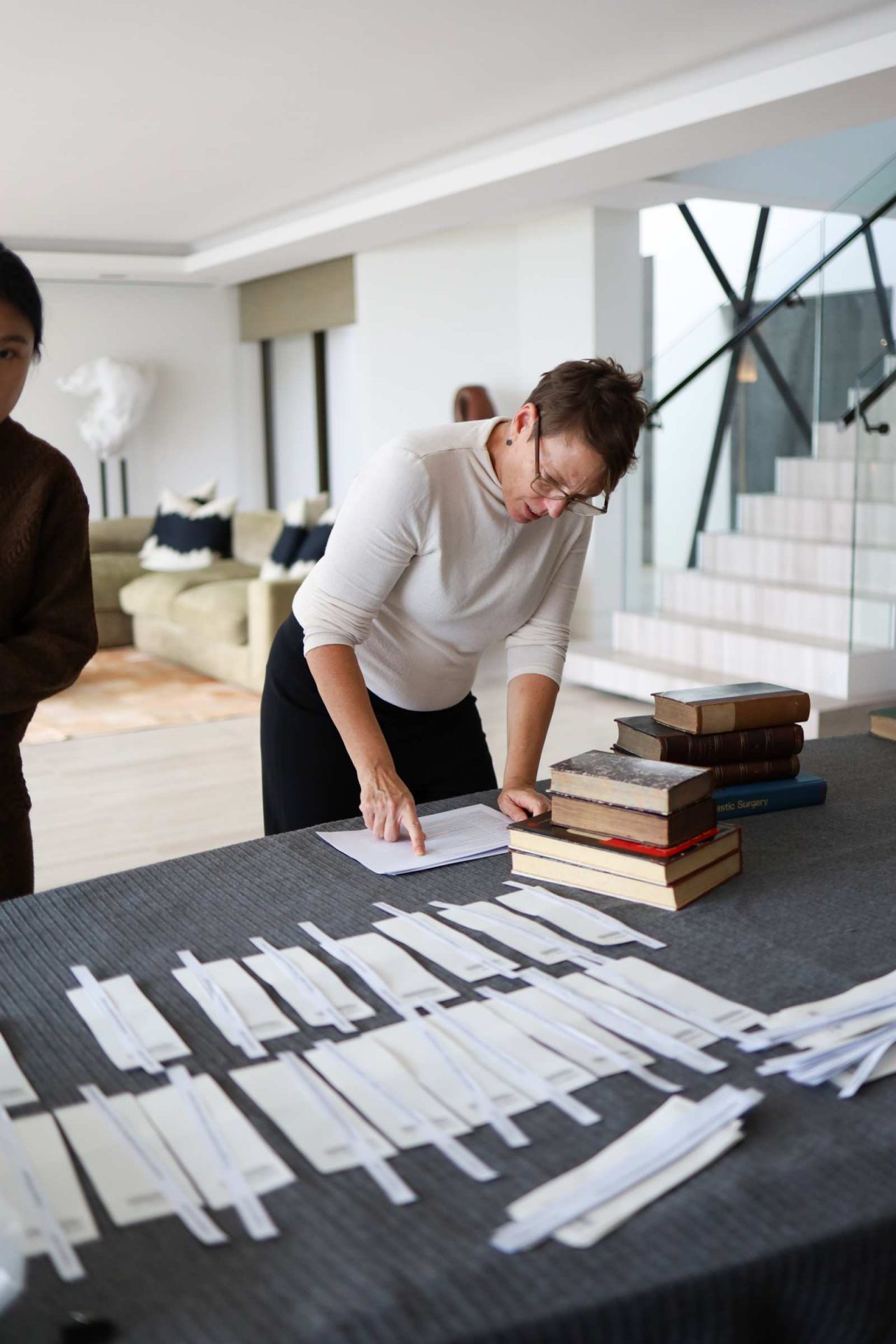 Library staff working on collection inventory and packaging