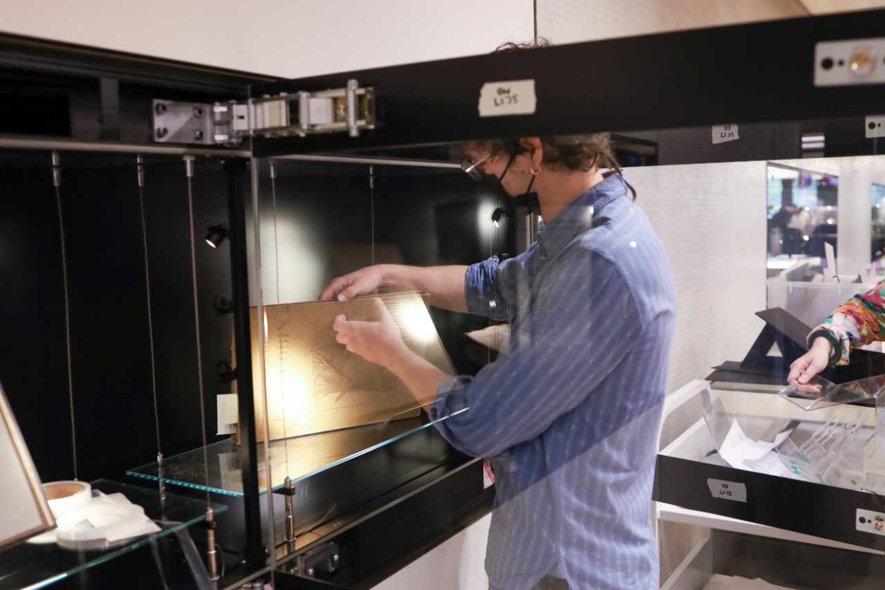 Callum Gallagher installing the exhibition