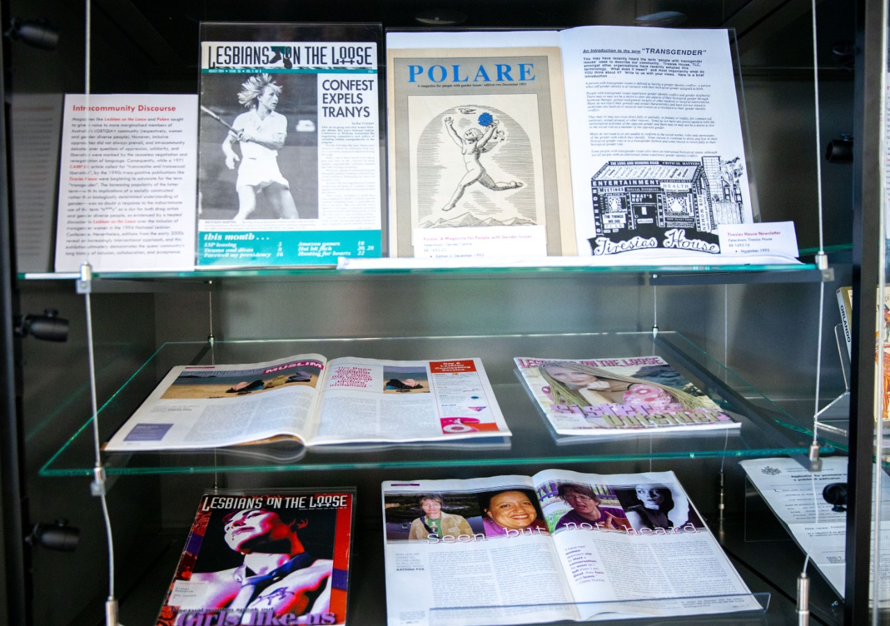 A selection of queer magazines, including Lesbians on the Loose, Tiresias House, and Polare