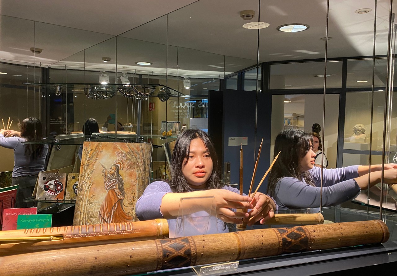 Starr Abelardo installing her exhibition at the Conservatorium Library