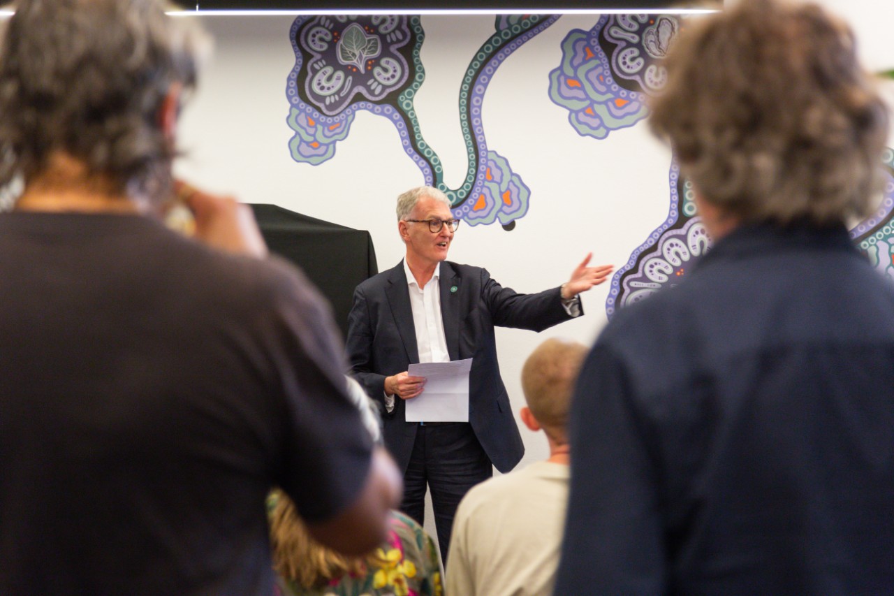 University Librarian Philip Kent speaking in front of attendees