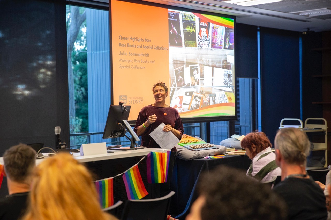 Manager of Rare Books and Special Collections, Julie Sommerfeldt, speaks in front of a crowd